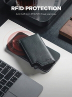 Black RFID protection wallet on a laptop with 'Vilantto' branding, placed on a desk.